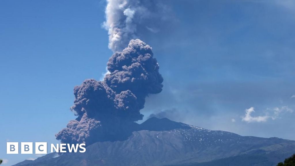 Mount Etna erupts as large plumes rise from Italian volcano
